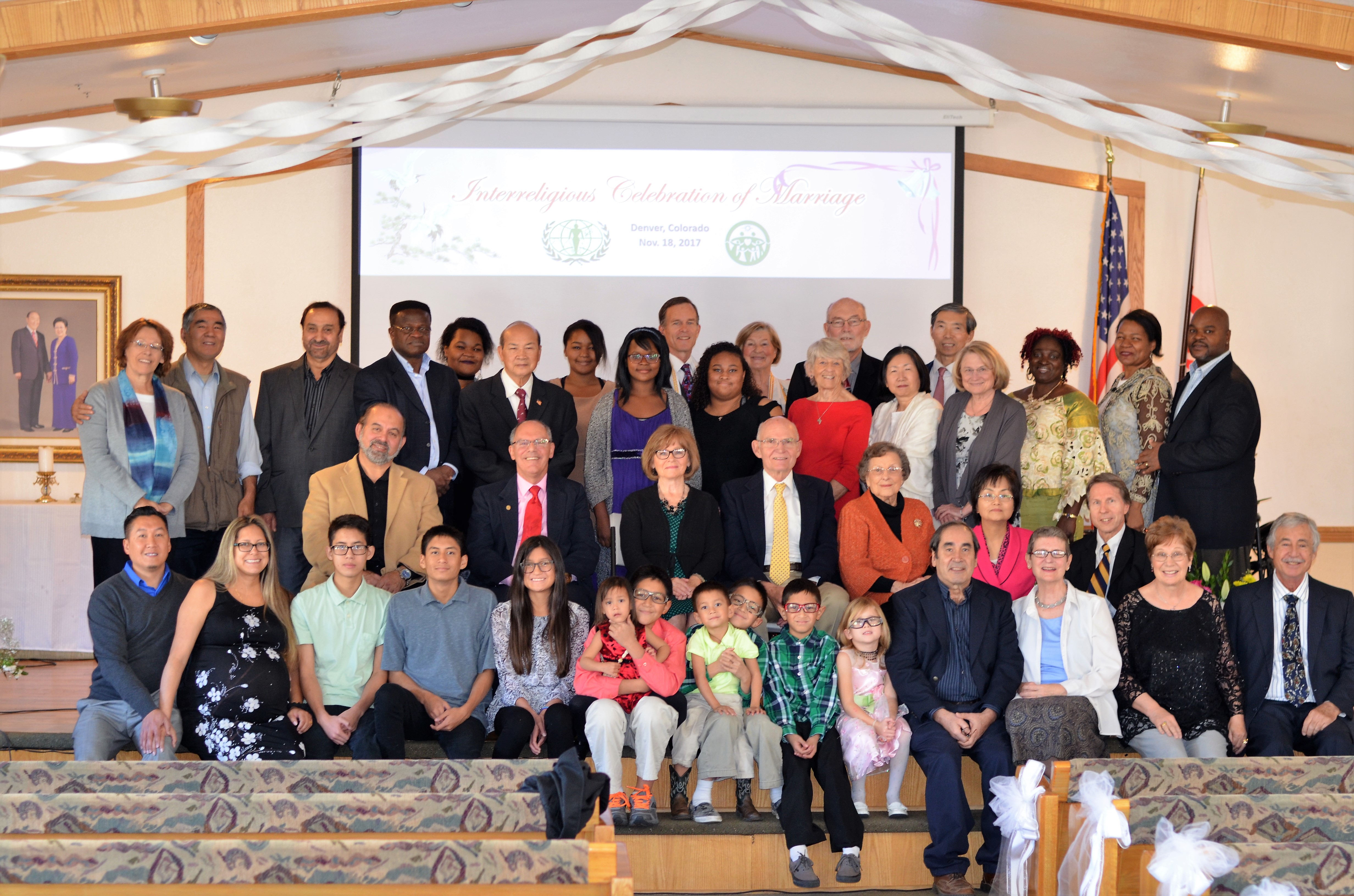 Group photo of the Interreligious Celebration of Marriage event in Denver