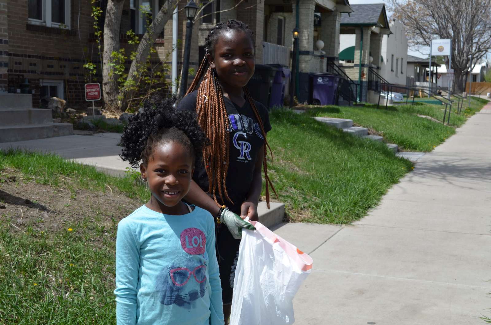 Enjoying the neighborhood trash pickup